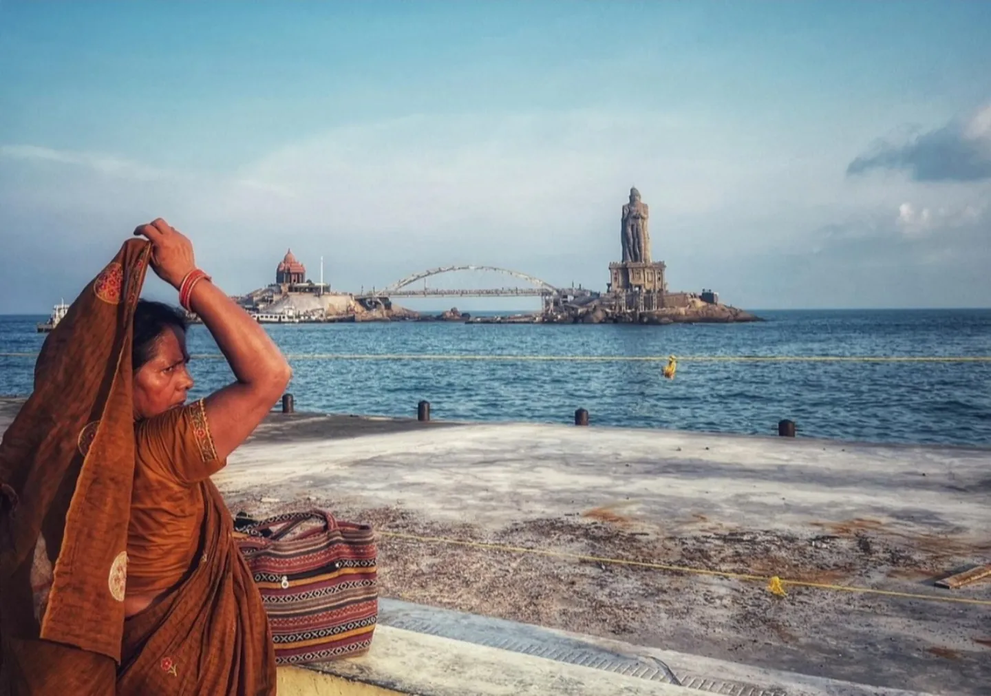 A coastal scene with monuments across the water