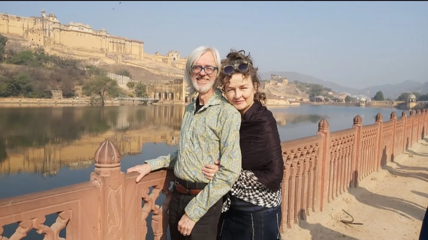 Visitors beside the lake below Amber Fort