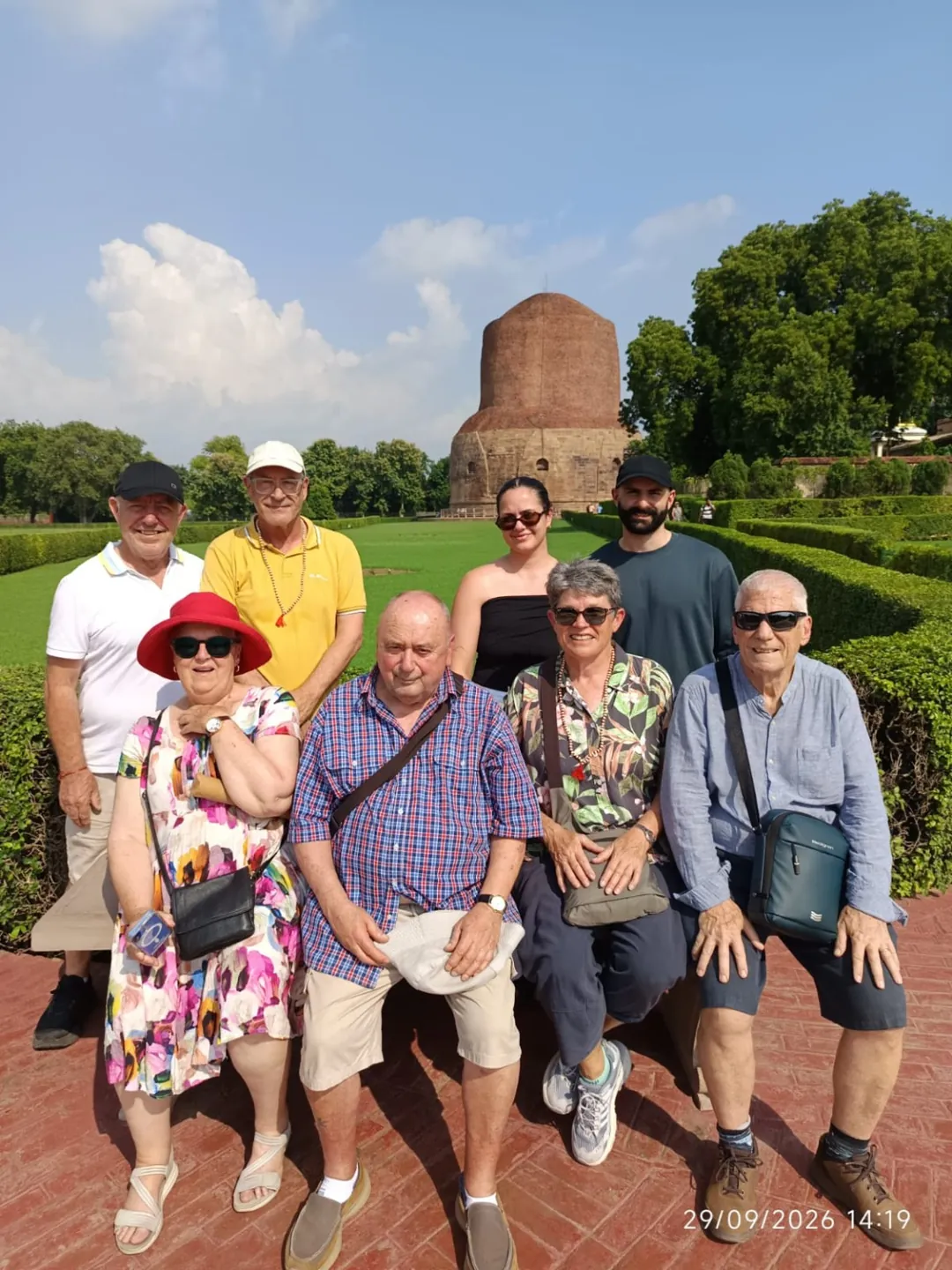 Travellers visiting the Buddhist heritage site at Sarnath